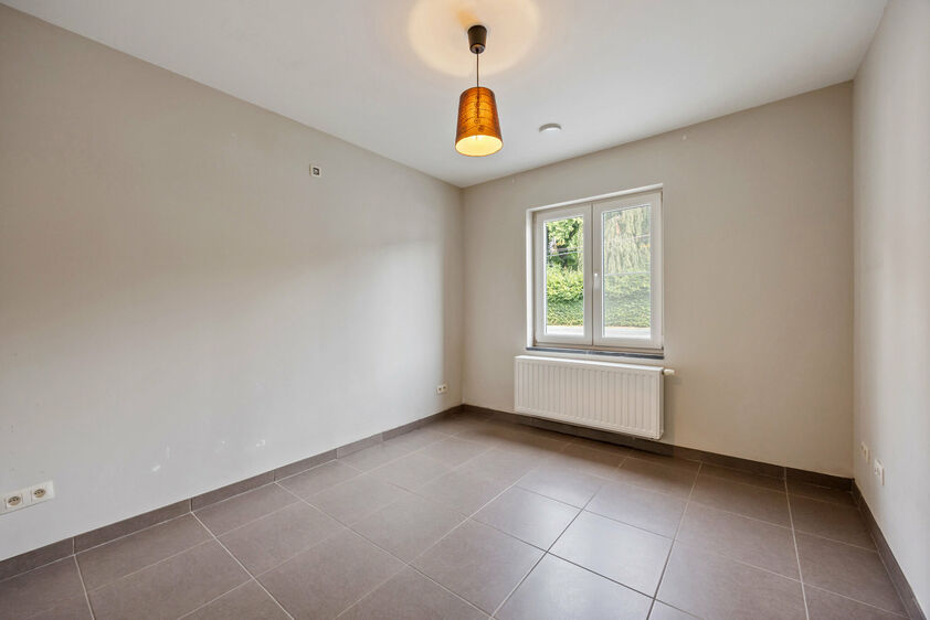 Gelijkvloerse verd. + tuin te koop in Bassenge